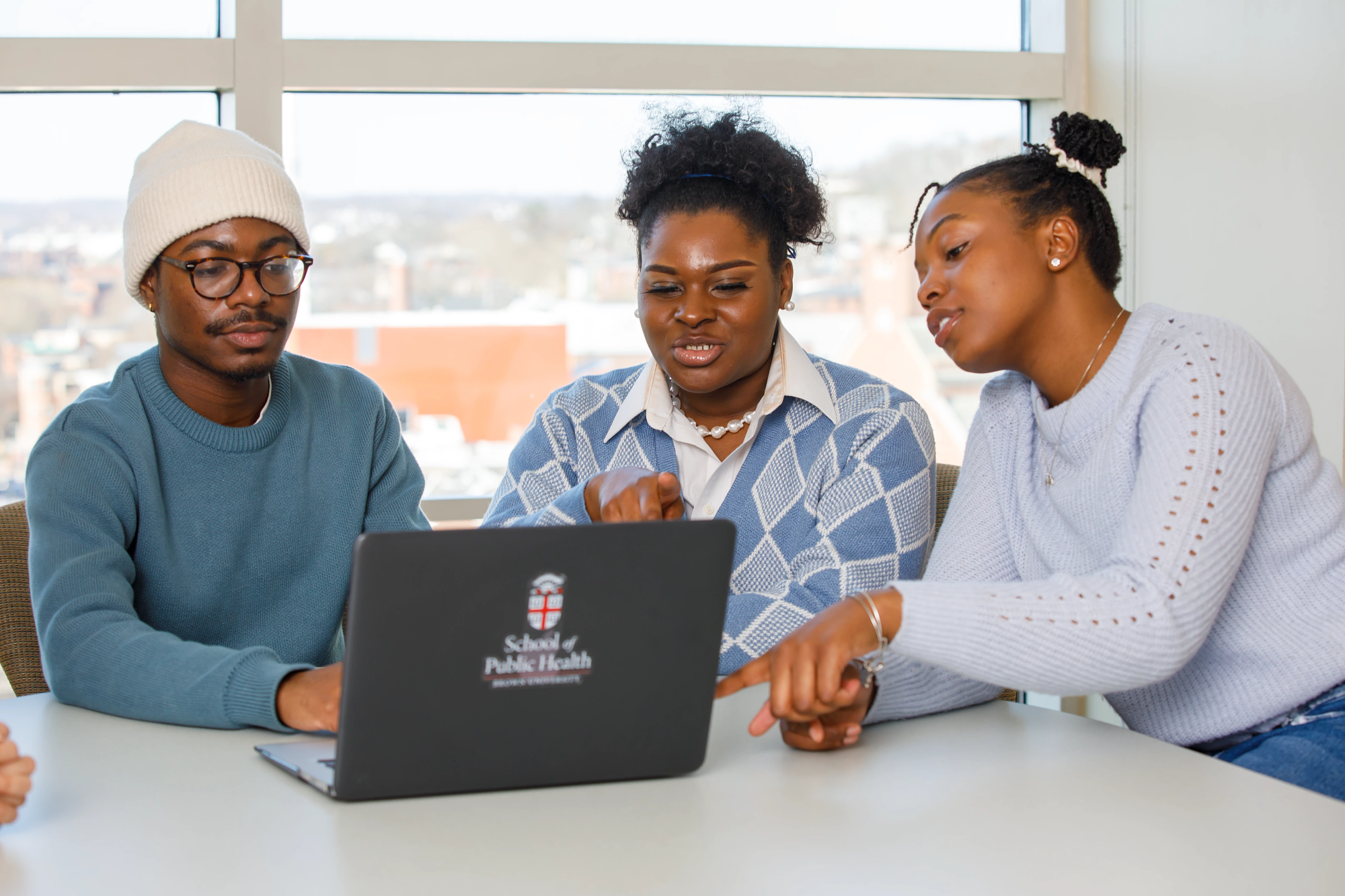 students sitting on a panel at the watson institute